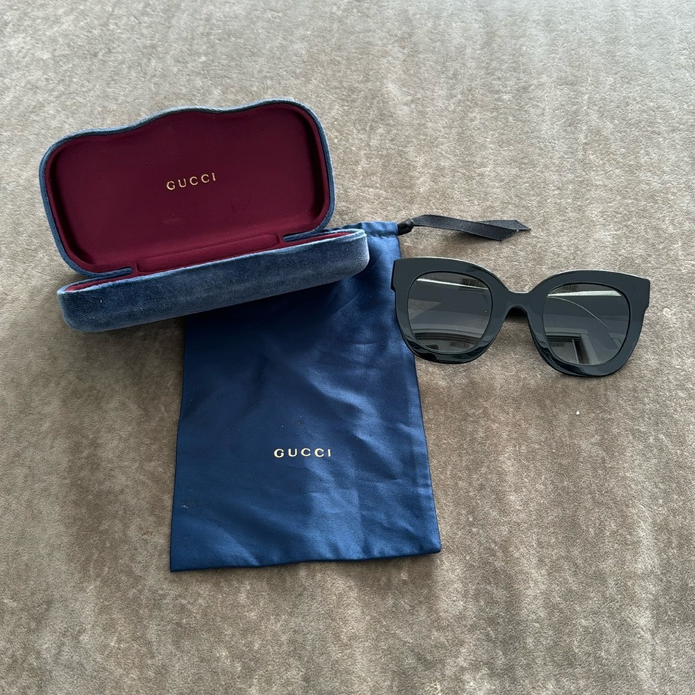 Authentic GUCCI sunglasses. Made in Italy. Gucci logo etched. Color- black. O/S